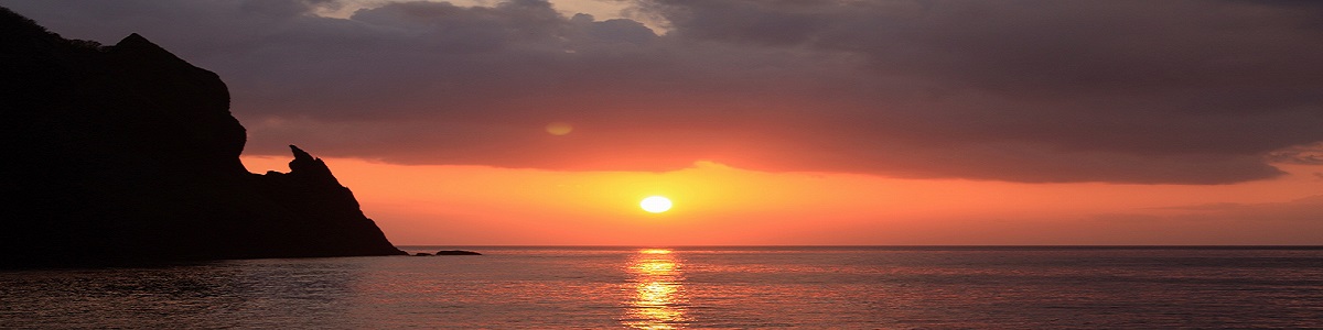 雷電、刀崖岩の夕日